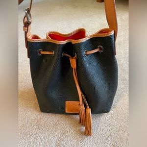 Dooney and Bourke Black and Tan Pebble Grain Bucket Bag